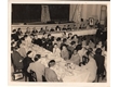 bc0002_078 - Padre Leonel Franca, S.J., e convidados, no almoço em comemoração ao Dia do Reitor, no auditório da antiga sede das Faculdades Católicas na rua São Clemente, 1945. Fotógrafo desconhecido. Acervo Núcleo de Memória.