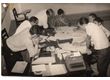 cg0078_052 - Alunos do IAG estudando, 1964. Atenção para a máquina de escrever, a calculadora, o apontador de lápis e o grampeador. Acervo Núcleo de Memória.