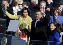 Presidente Barack Obama ao lado da primeira dama Michelle e as filhas, Malia e Sasha.